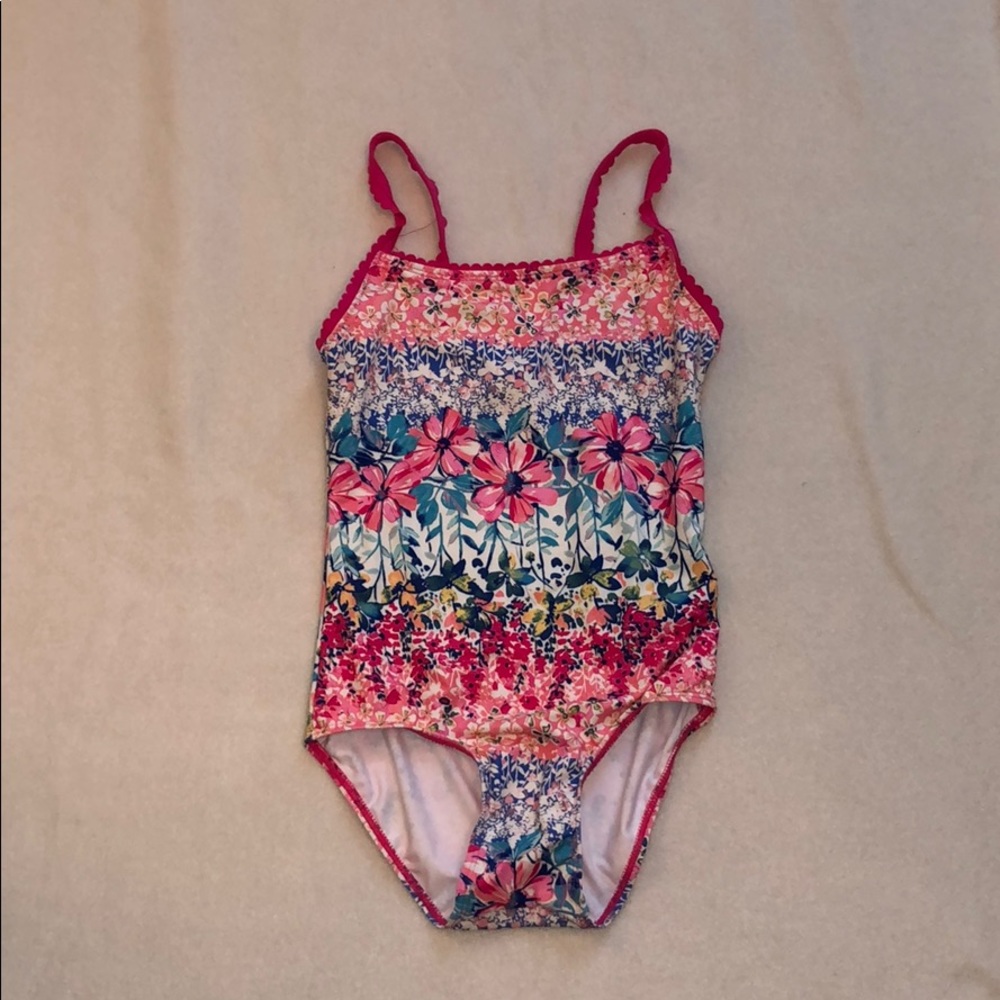 A pink one piece bathing suit